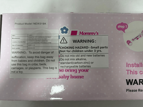 Recalled Baby Doll Playset – front package label with model number